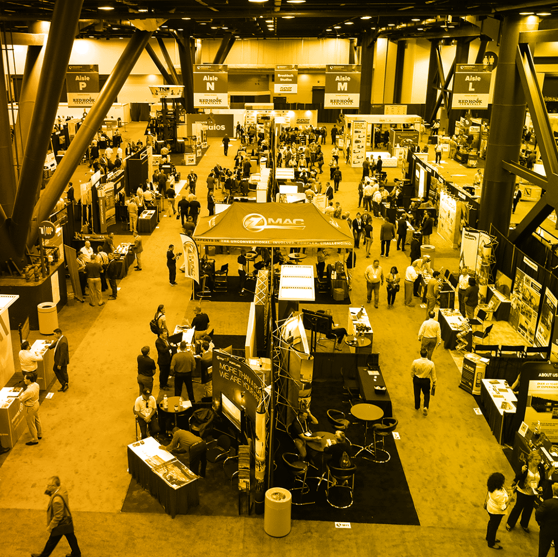birds eye view of people walking around at a trade show